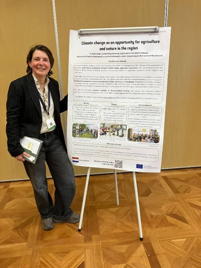 Erika Frankhuizen naast flipover