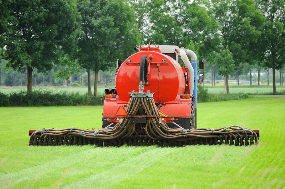 Precisiebemesting met tractor in land